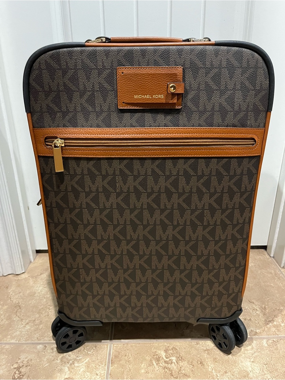 Michael Kors Brown Monogram Carry-On with Tan Trim. Excellent condition.